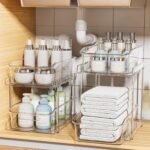 Delamu 2-Tier Under Sink Organizers and Storage, Multi-Purpose Stackable Bathroom Cabinet organizers, Pull Out Kitchen Pantry Organization and Storage with Dividers(2 Pack, Clear) - Image 2
